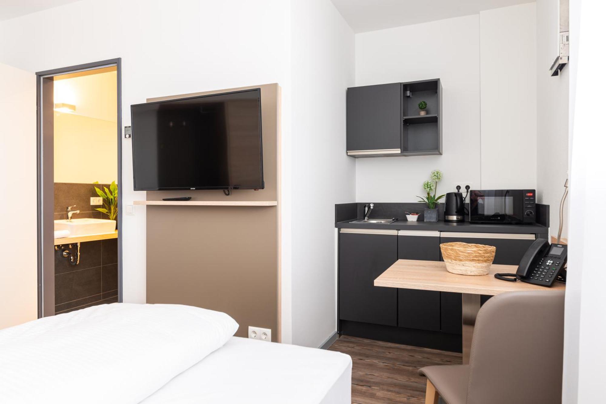 Aparthotel Avangard Living Fitness & Spa 포르히하임 외부 사진